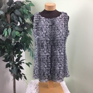 Notations large black and white layered ruffled sleeveless top
Fully lin…